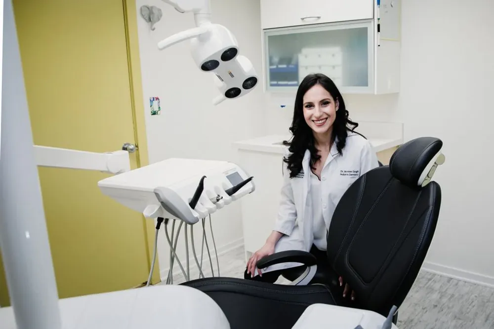 Dr. Jasveen Singh chairside in her operatory.